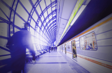 Blurry photo of man with motion sickness at train station